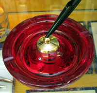 Ruby red glass pen base.